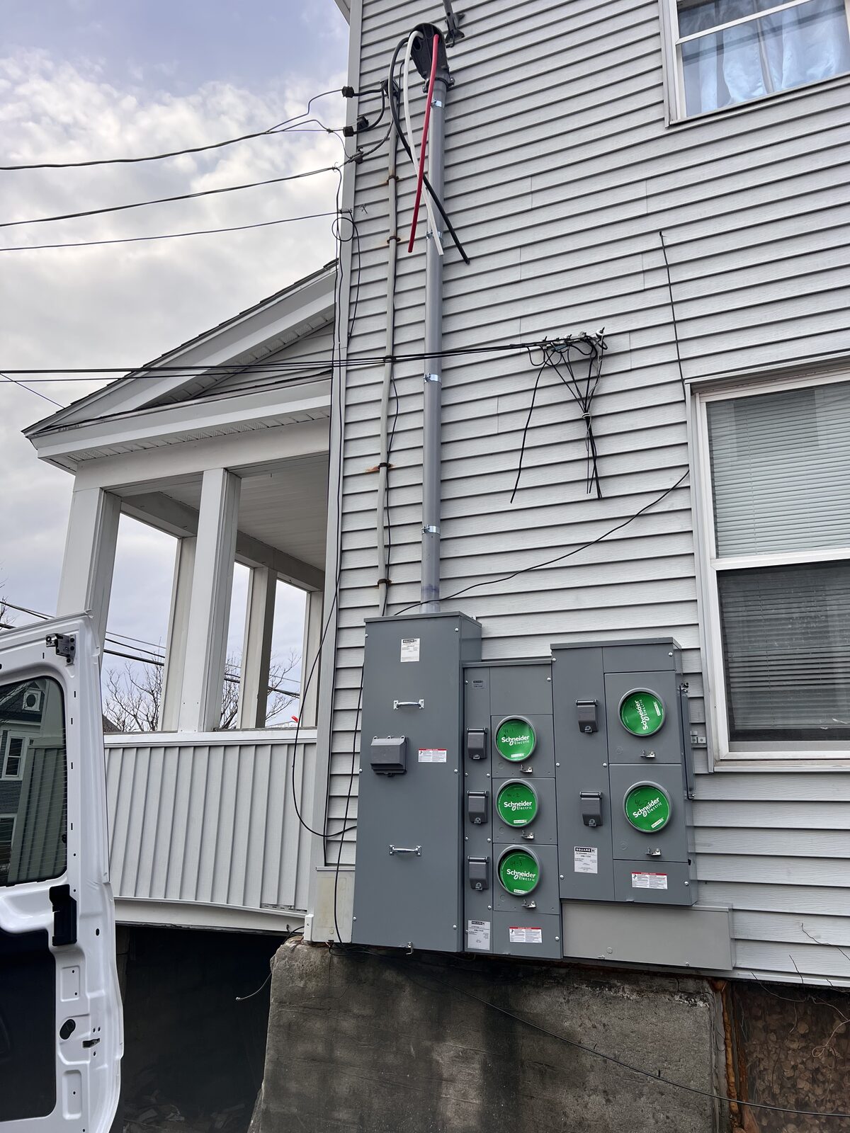 Exterior electrical service and meter installation on a multi-family home
